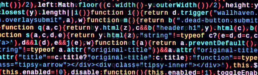 Writing programming code on laptop. Digital binary data on computer screen