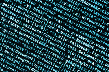 Writing programming code on laptop. Digital binary data on computer screen