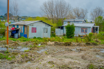 Fototapeta na wymiar Outdoor view of wooden house buildings located in Ancud Village Houses, in Chiloe Island Chile