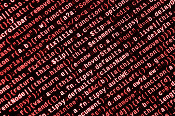 Writing programming code on laptop. Digital binary data on computer screen