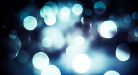 Obraz premium abstract Christmas background with holiday lights and copy space - magic bokeh glitter with blinking stars and falling snowflakes