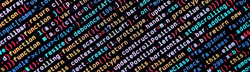 Writing programming code on laptop. Digital binary data on computer screen
