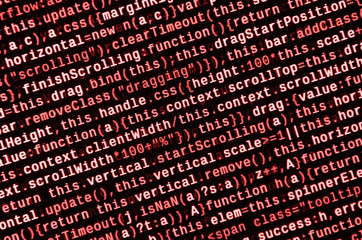Writing programming code on laptop. Digital binary data on computer screen