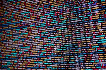 Software developer programming code on computer. Abstract computer script source code