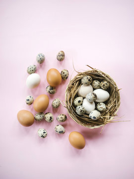 Composed raw Easter eggs on table