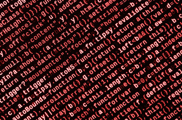 Writing programming code on laptop. Digital binary data on computer screen