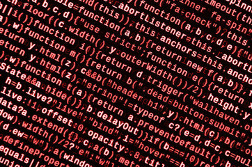 Writing programming code on laptop. Digital binary data on computer screen