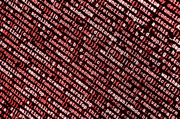 Writing programming code on laptop. Digital binary data on computer screen