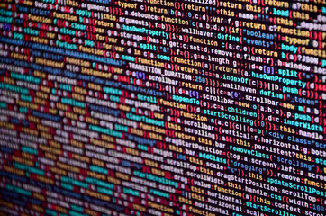 Software developer programming code on computer. Abstract computer script source code