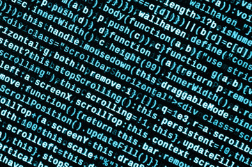 Writing programming code on laptop. Digital binary data on computer screen