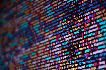 Software developer programming code on computer. Abstract computer script source code