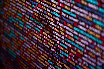 Software developer programming code on computer. Abstract computer script source code