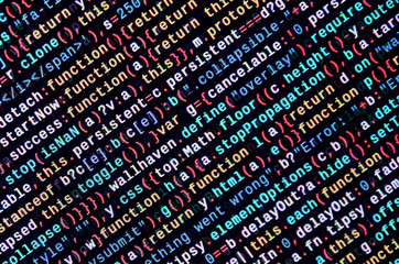 JavaScript code in text editor. Coding cyberspace concept. Screen of web developing code