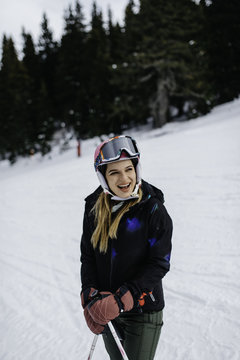 Girl smiling and enjoying on ski vacation