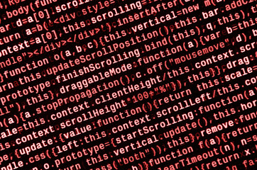 Writing programming code on laptop. Digital binary data on computer screen