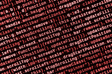 Writing programming code on laptop. Digital binary data on computer screen