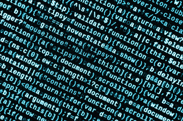 Writing programming code on laptop. Digital binary data on computer screen