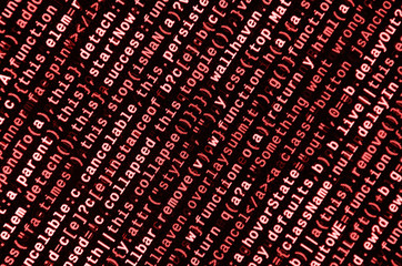 Writing programming code on laptop. Digital binary data on computer screen