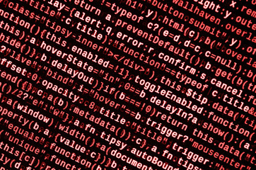 Writing programming code on laptop. Digital binary data on computer screen