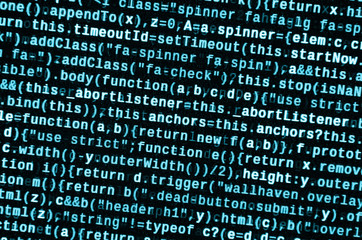 Big data and Internet of things trend. IT specialist workplace. Website HTML Code on the Laptop...