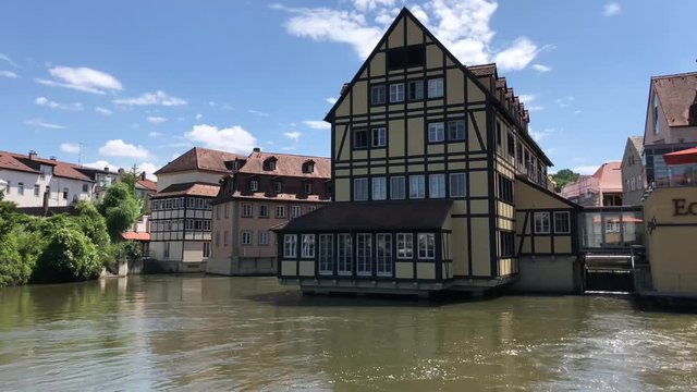 Timber frame houses and the regnitz river in the old town of Bamberg Germany