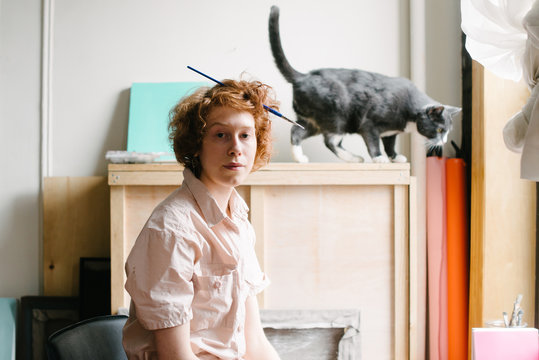 Serious painter in her studio