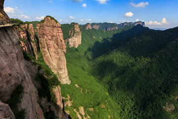 Shenxianju Scenic Area - Xianju County, Taizhou, Zhejiang Province China. Known as the "Place Where Spirits Reside", Chinese Canyon Scenery with steep cliffs,  aerial view above green forests below