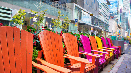 Toronto, Canada-12 October, 2018: Colorful chairs on King street in front if TIFF (Toronto...