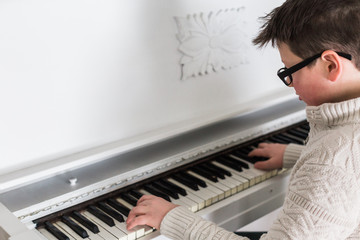 Playing the white piano