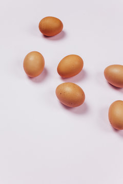Eggs on pink background