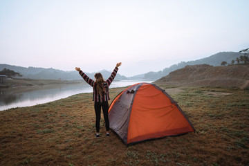 portrait a woman enjoy the morning and rise arm