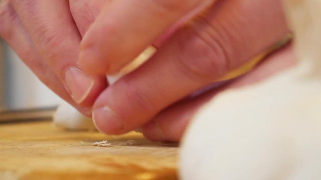 Close up, cutting garlic