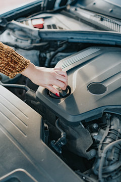 A woman with car problems