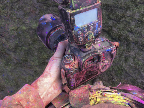 Camera covered with colorful dyes after a shoot