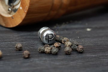 Black pepper with the grinder knob labelled as P