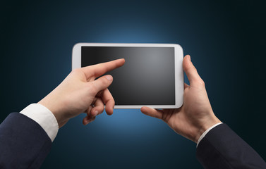 Hand using tablet with no concept and empty space
