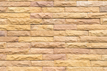 Beautiful yellow stone wall background