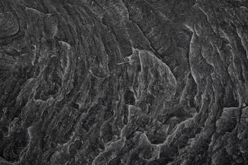 Black granite stone rough texture background