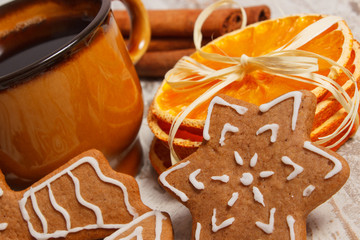 Fresh gingerbread, cup of coffee and spices, christmas time