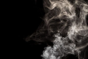 Abstract white smoke vertical line on black background