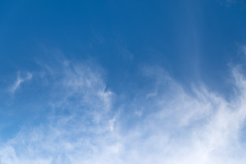 clear blue sky with white clouds