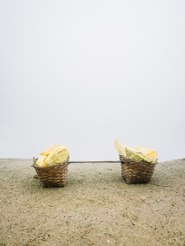 Baskets full of yellow sulfur mineral