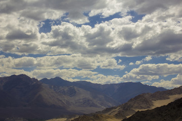 beautiful overcast over the mountains and clouds shadows