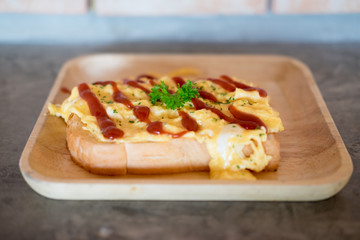 Fresh scrambled eggs with toast