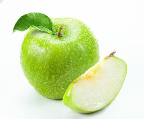 green apple with slice isolated white background 
