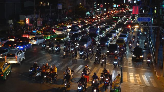Bangkok, Thailand - October 12, 2018 :  Traffic moment of Asoke Montri junction at night