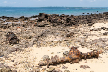 Artifacts and wreckage on beach at Million Dollar Point, Luganville, Vanuatu