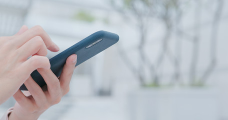 Woman use of smart phone at outdoor
