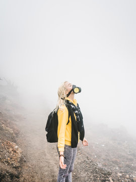 Traveler in dangerous sulfur evaporation