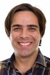 Fototapeta premium Face of young happy Persian man smiling